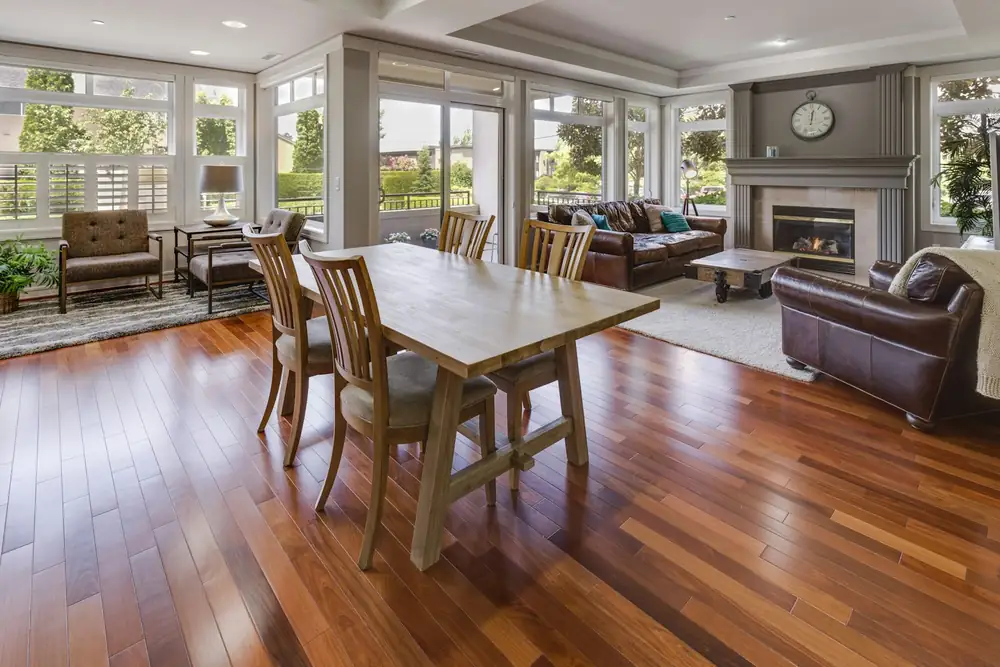 Living and dining room with new wide-plank hardwood floors